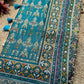Teal Patola Saree with Floral Motifs & Embellished Border