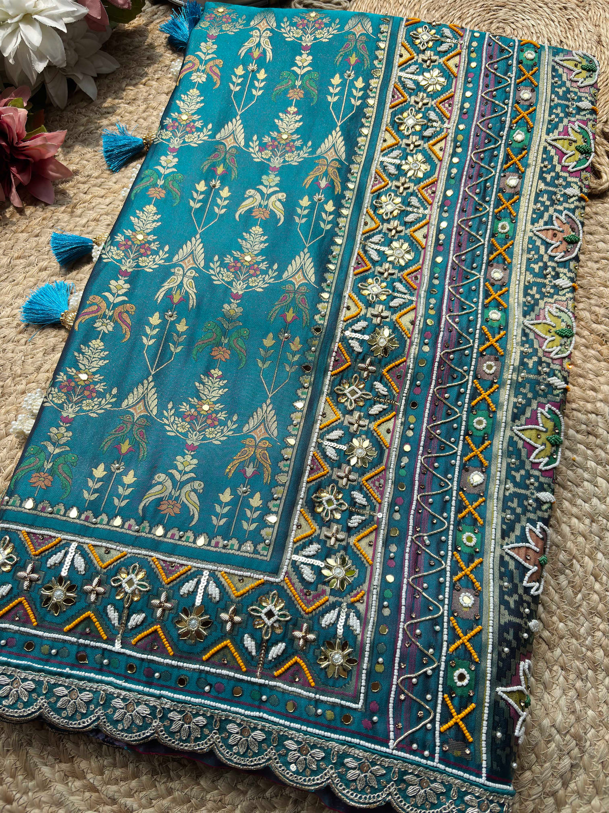 Teal Patola Saree with Floral Motifs & Embellished Border