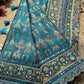 Teal Patola Saree with Floral Motifs & Embellished Border