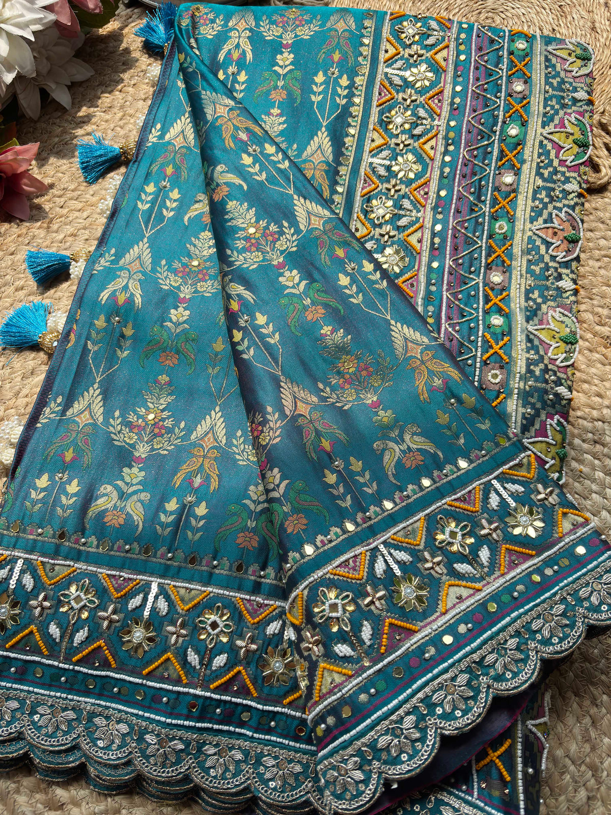 Teal Patola Saree with Floral Motifs & Embellished Border