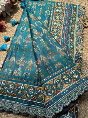 Teal Patola Saree with Floral Motifs & Embellished Border