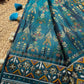 Teal Patola Saree with Floral Motifs & Embellished Border