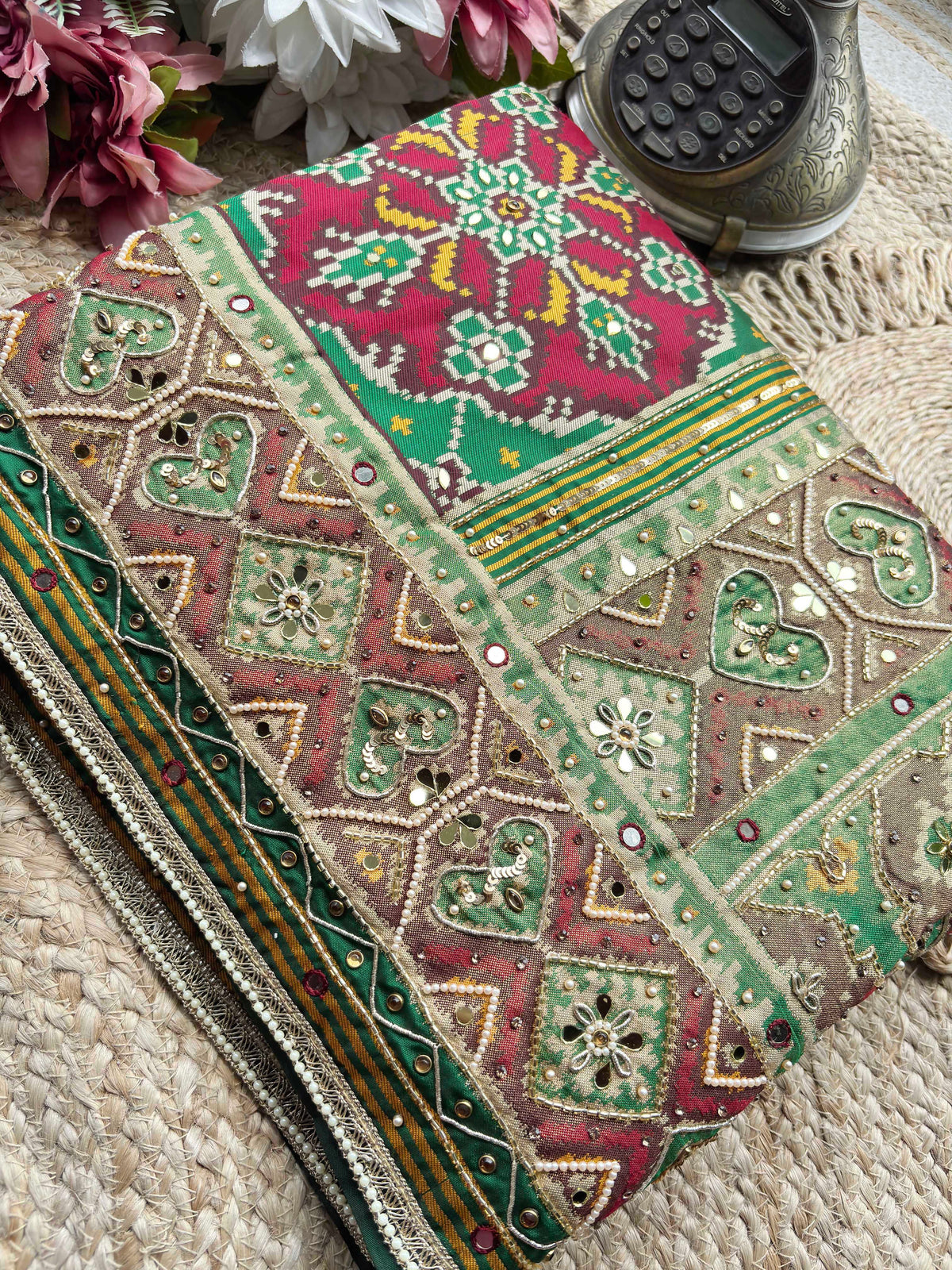 Green Patola Woven Saree with Mirror & Pearl Embellished Border