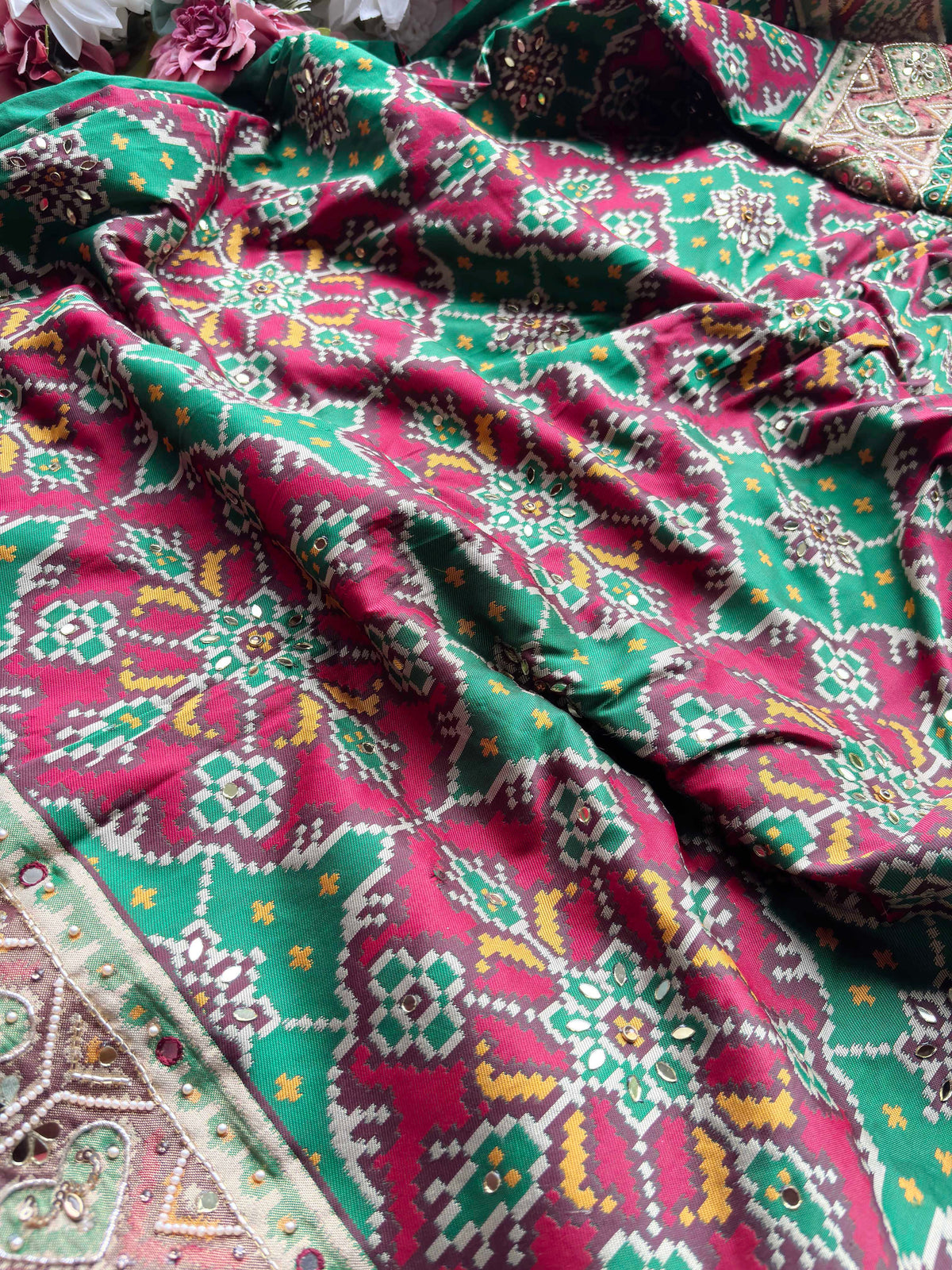 Green Patola Woven Saree with Mirror & Pearl Embellished Border