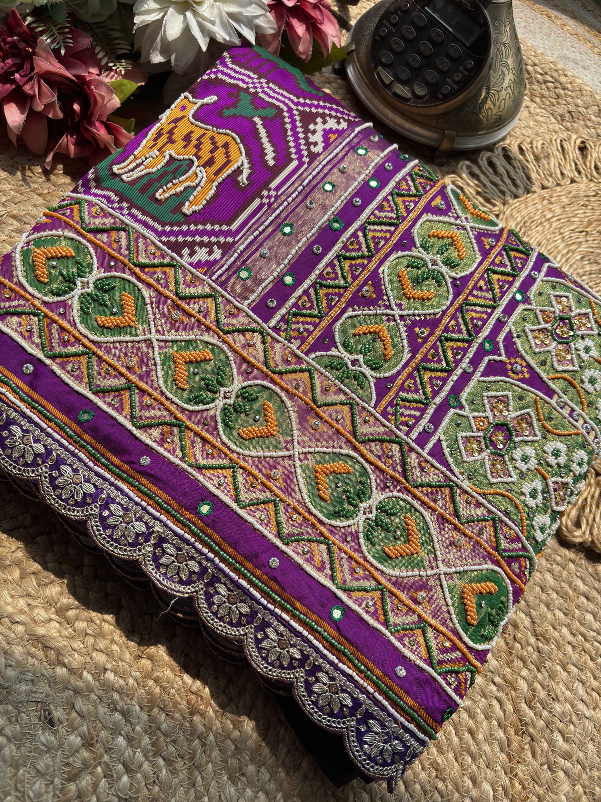 Purple Patola Saree with Tiger Motifs & Beaded Border