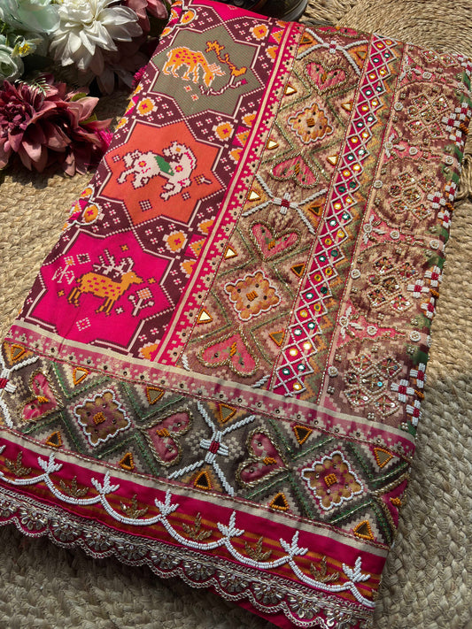 Rani Pink Patola Saree with Animal Motifs & Embellished Border