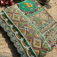 Green Patola Saree with Animal Motifs & Embellished Border
