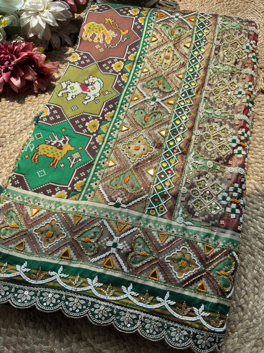 Green Patola Saree with Animal Motifs & Embellished Border