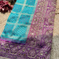Turquoise Patola Saree with Purple Embellished Paisley Border