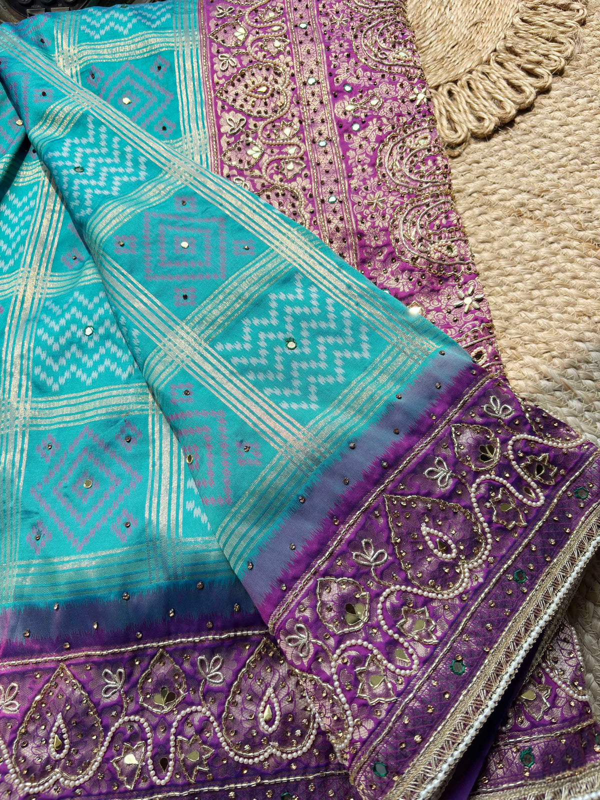 Turquoise Patola Saree with Purple Embellished Paisley Border