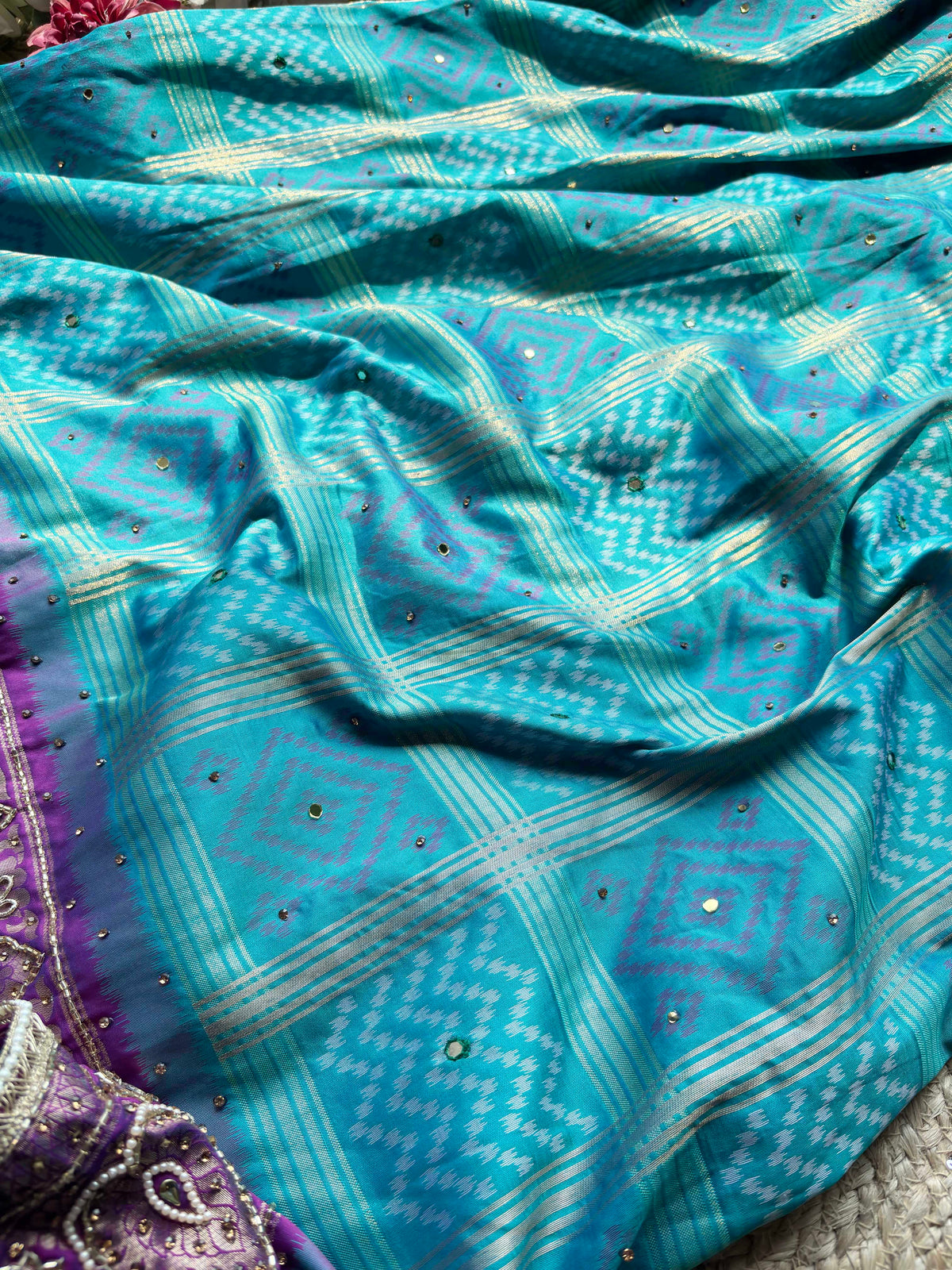Turquoise Patola Saree with Purple Embellished Paisley Border