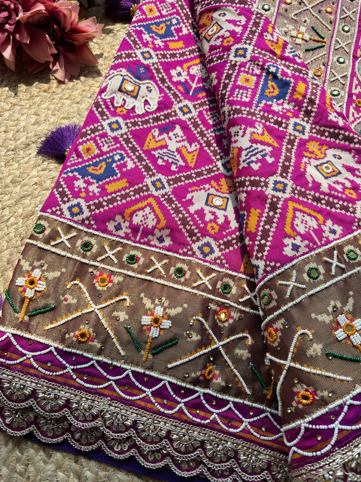 Magenta Patola Saree with Elephant Motifs & Embellished Border