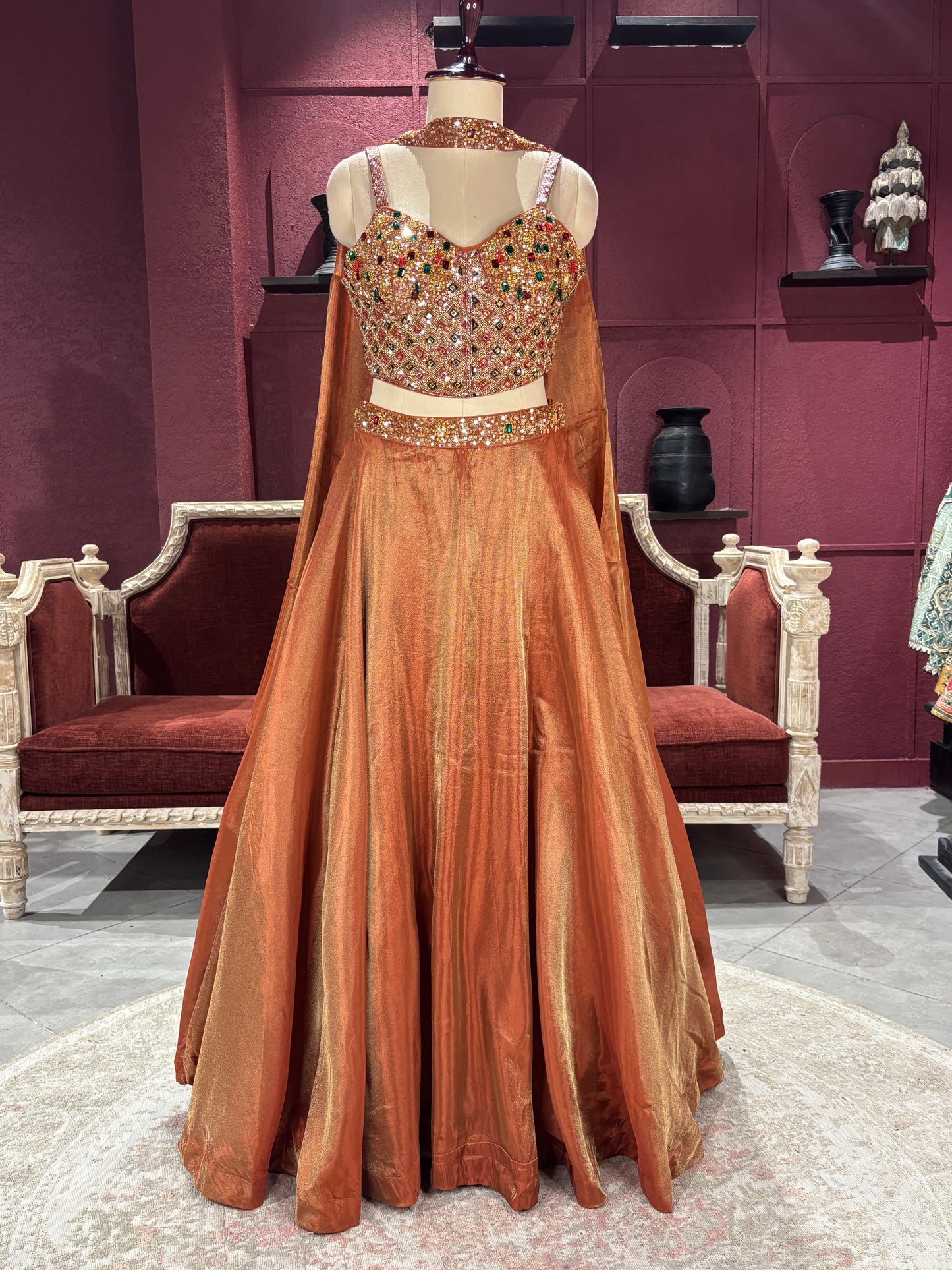 Designer Bronze Lehenga with Multicolor Embellished Blouse