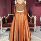 Designer Bronze Lehenga with Multicolor Embellished Blouse