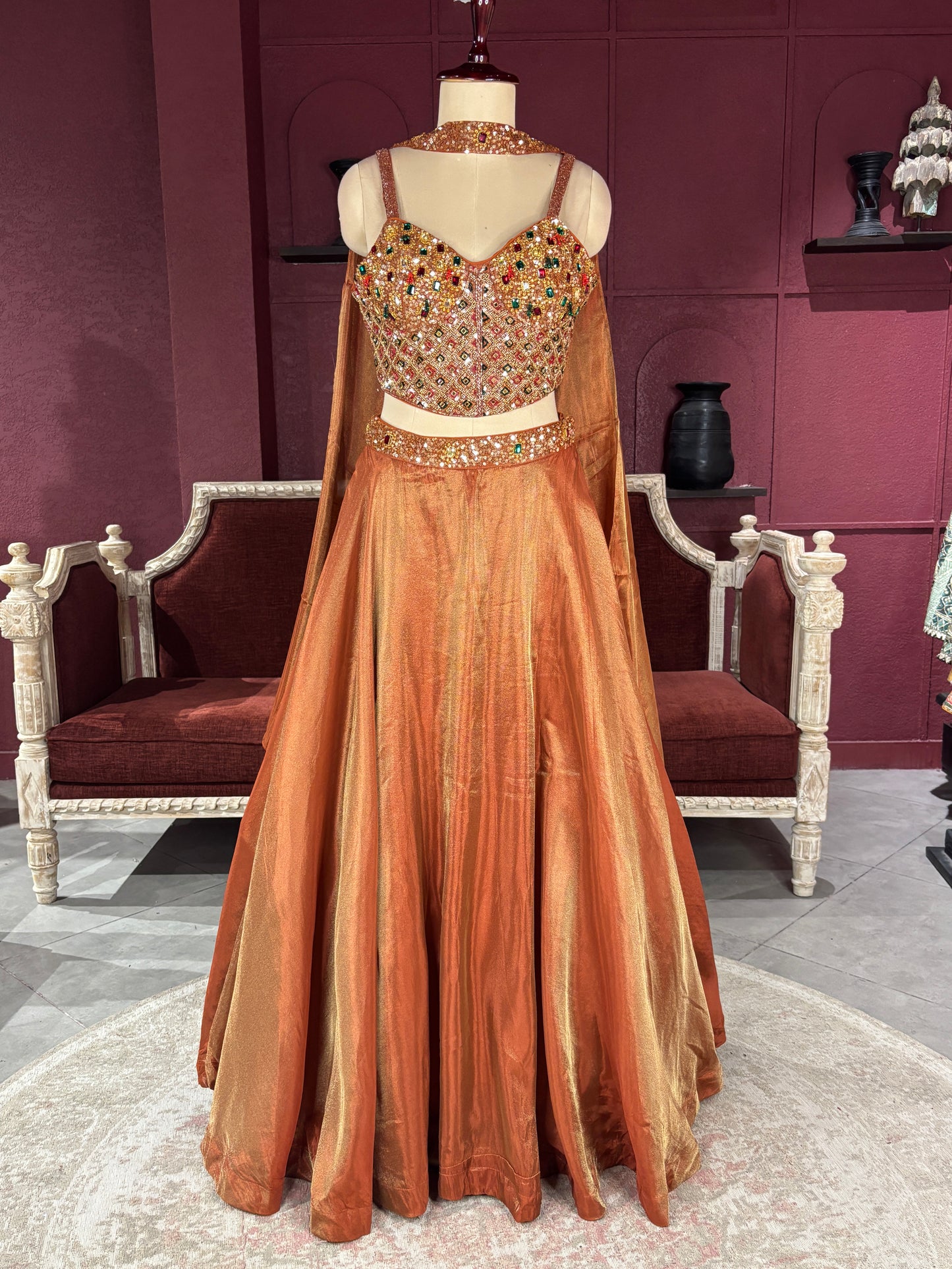 Designer Bronze Lehenga with Multicolor Embellished Blouse