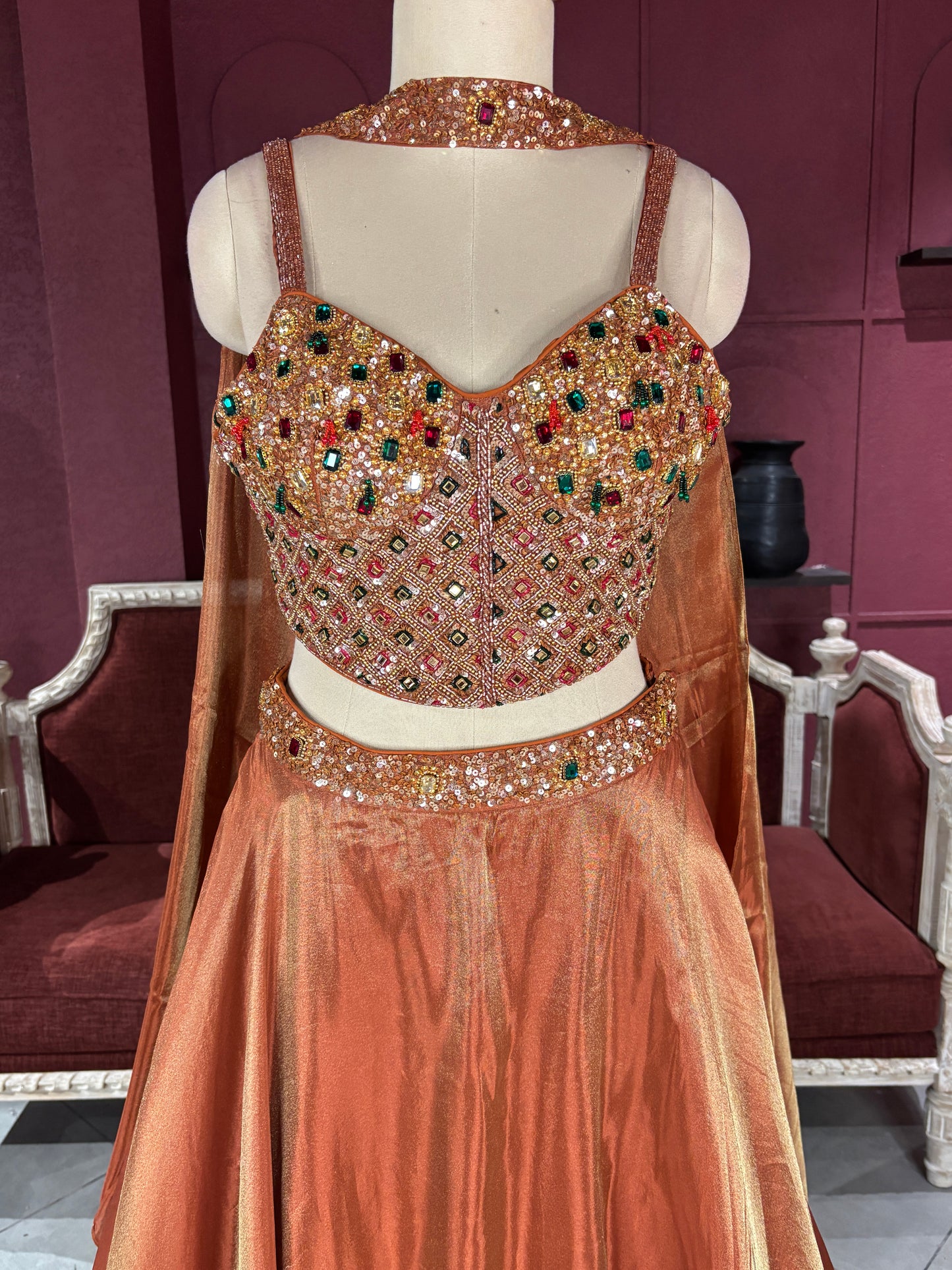 Designer Bronze Lehenga with Multicolor Embellished Blouse