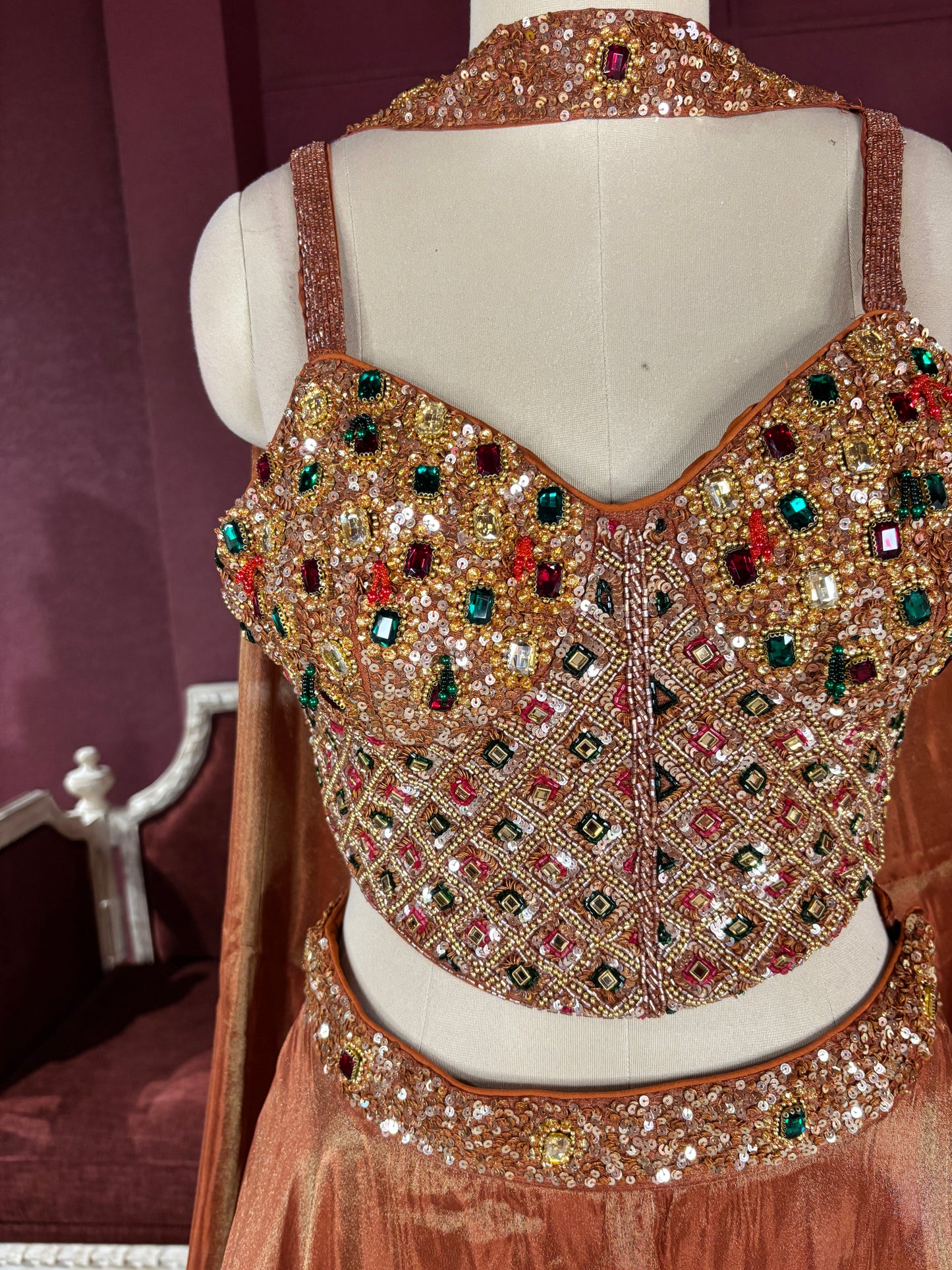 Designer Bronze Lehenga with Multicolor Embellished Blouse