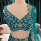 Teal Bloom Designer Lehenga Set with Silver Zari & Floral Motifs