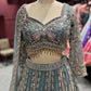 Teal Green Heavy Embroidered Net Lehenga with Designer Blouse