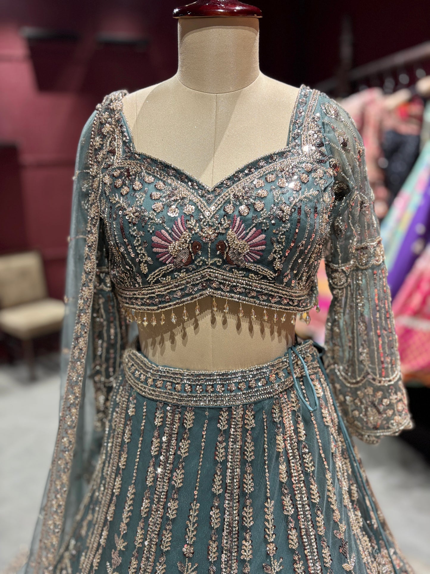 Teal Green Heavy Embroidered Net Lehenga with Designer Blouse