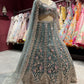 Teal Green Heavy Embroidered Net Lehenga with Designer Blouse