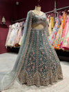 Teal Green Heavy Embroidered Net Lehenga with Designer Blouse