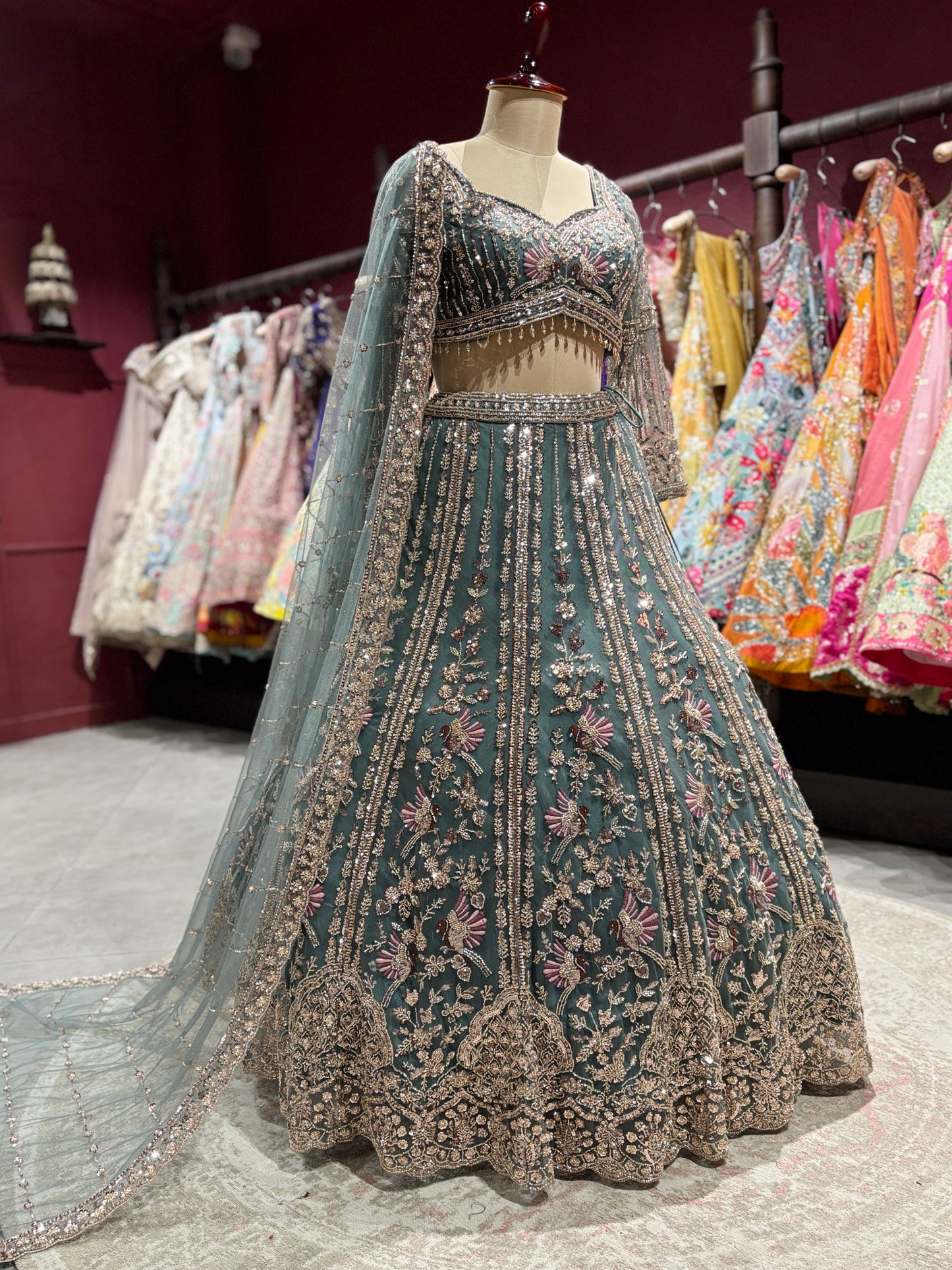 Teal Green Heavy Embroidered Net Lehenga with Designer Blouse