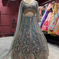 Teal Green Heavy Embroidered Net Lehenga with Designer Blouse