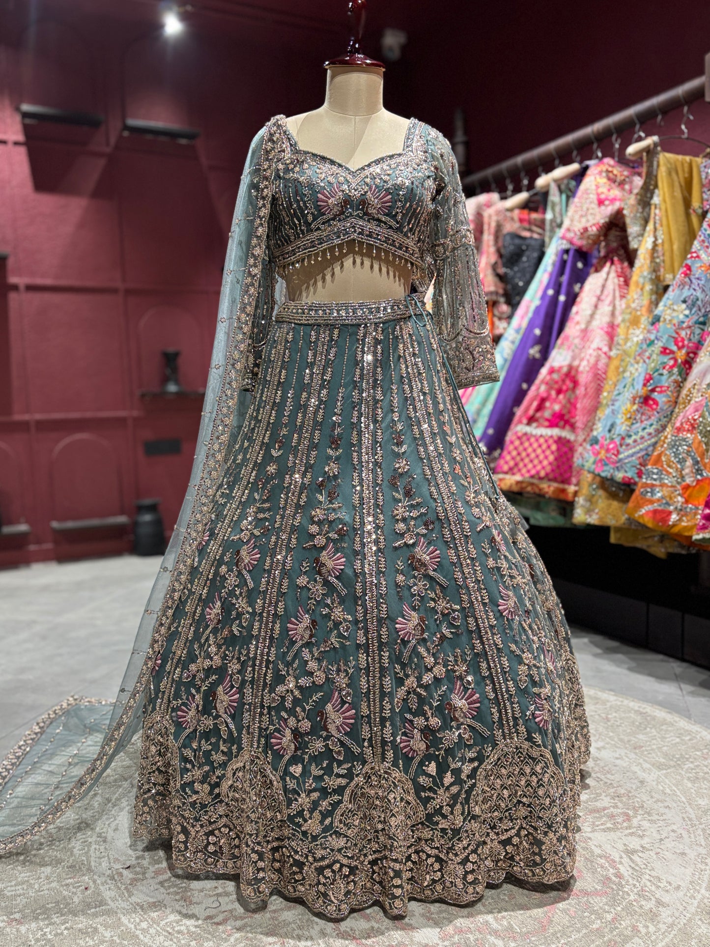 Teal Green Heavy Embroidered Net Lehenga with Designer Blouse