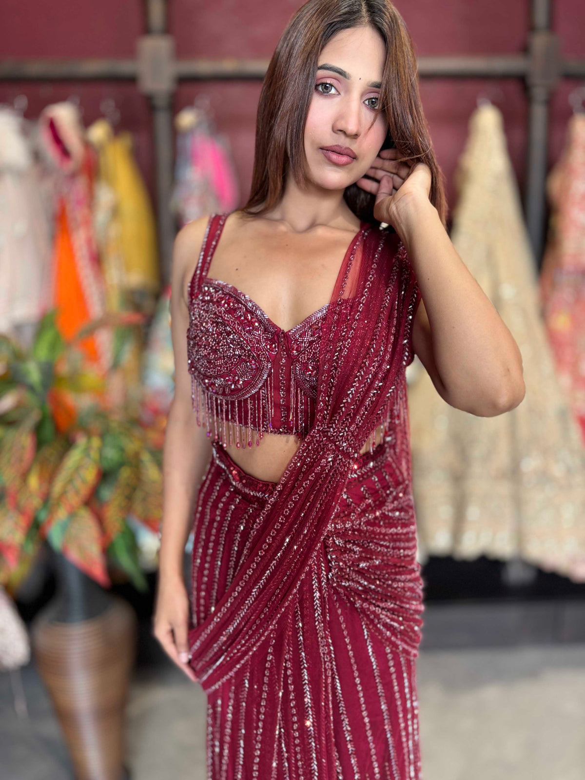 Wine Sequin Draped Saree with Embellished Corset Blouse