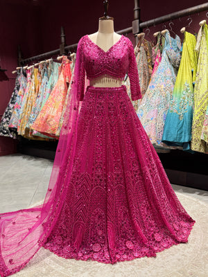 Rani Pink Heavy Embroidered Party Wear Lehenga Choli with Dupatta