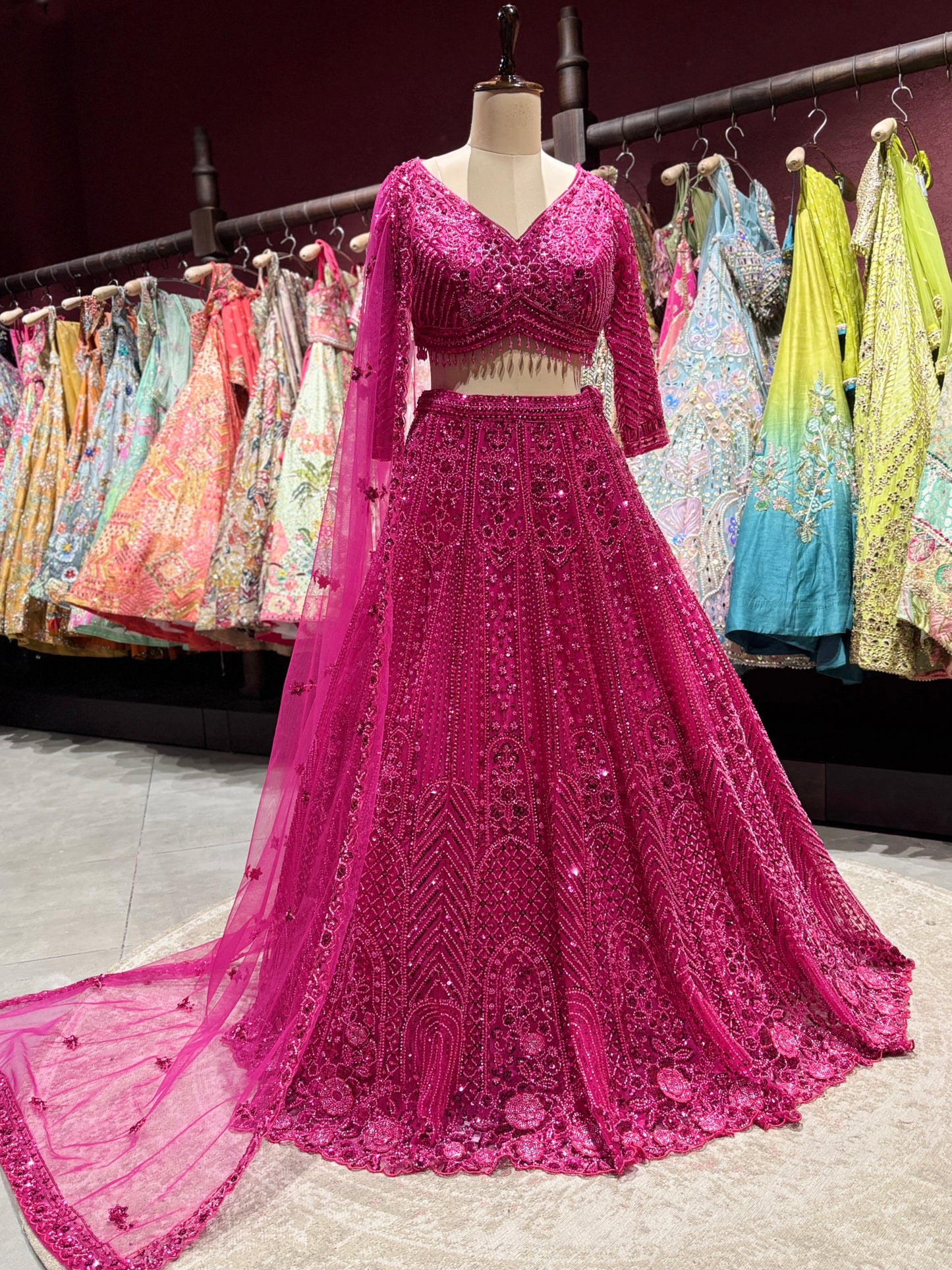 Rani Pink Heavy Embroidered Party Wear Lehenga Choli with Dupatta
