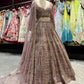 Dusty Rose Heavy Zari Embroidered Lehenga with Net Dupatta