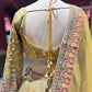 Mustard Yellow Zari  Silk Lehenga with Scenic Motif Dupatta