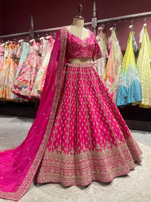 Rani Pink Zari Embroidered Bridal Lehenga with Net Dupatta