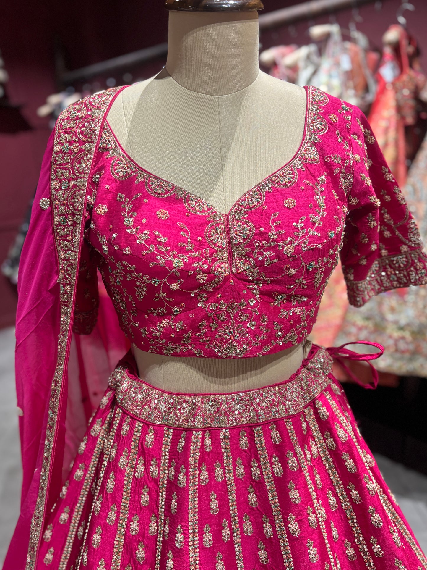 Rani Pink Zari Embroidered Bridal Lehenga with Net Dupatta