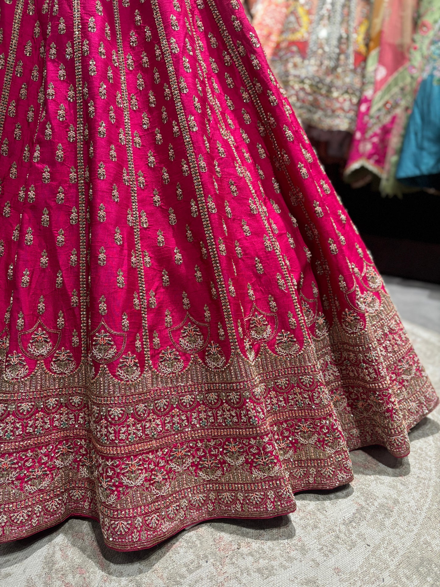 Rani Pink Zari Embroidered Bridal Lehenga with Net Dupatta