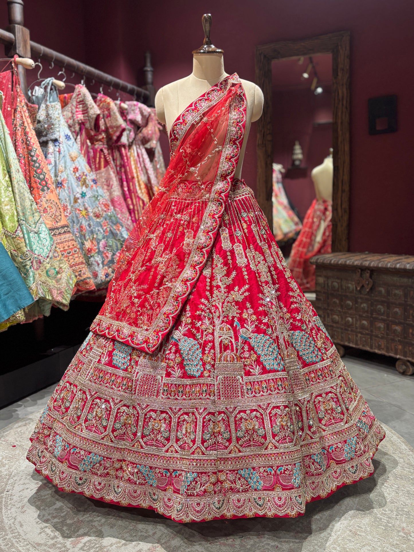 Designer Red Unstitched Bridal Lehenga with Peacock Zari Embroidery