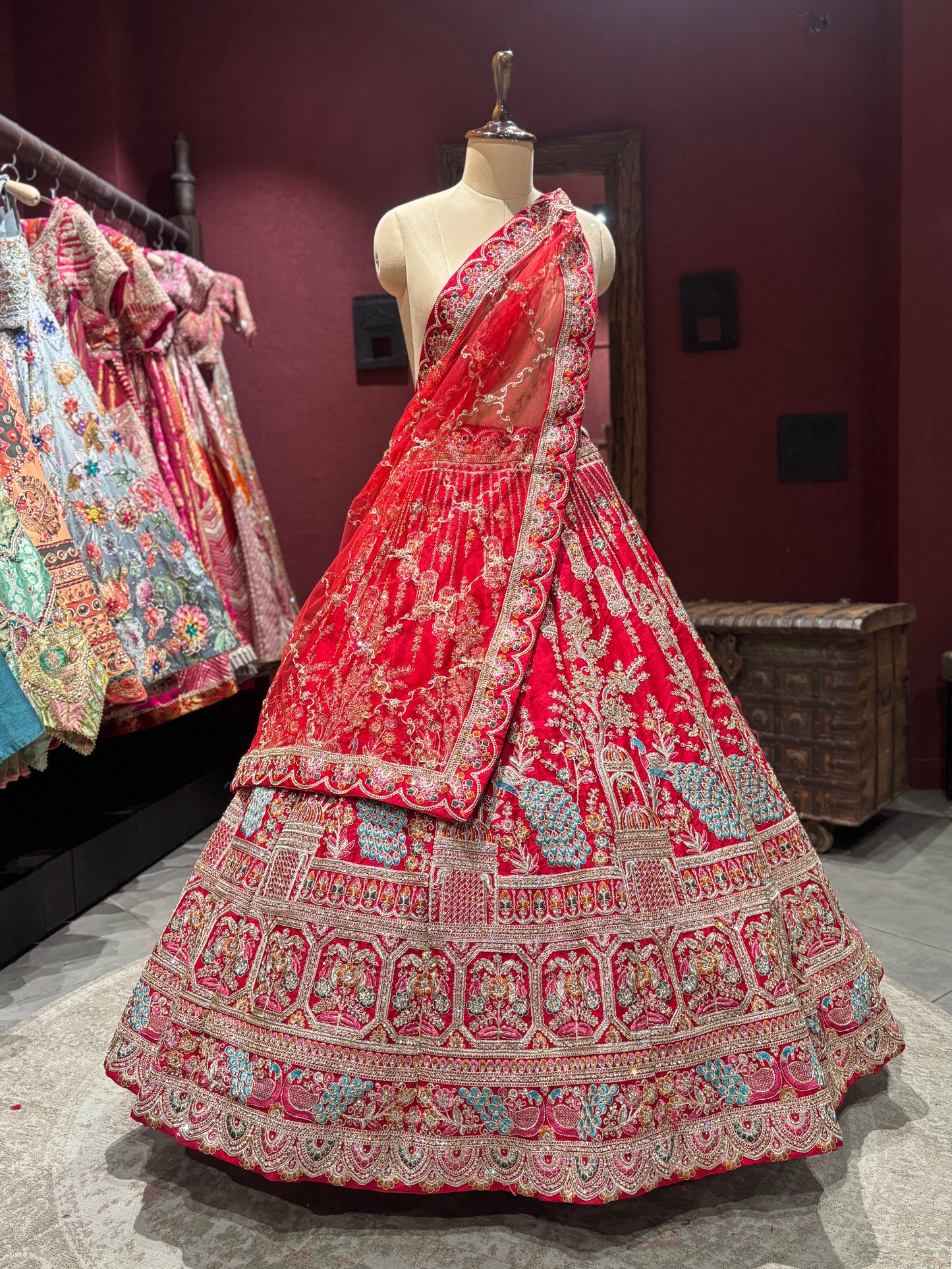 Designer Red Unstitched Bridal Lehenga with Peacock Zari Embroidery