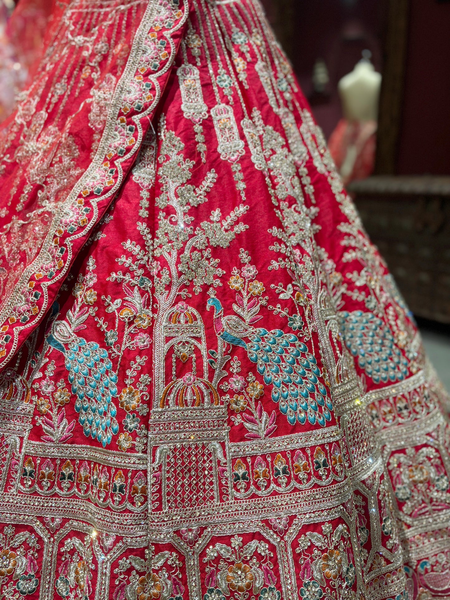 Designer Red Unstitched Bridal Lehenga with Peacock Zari Embroidery