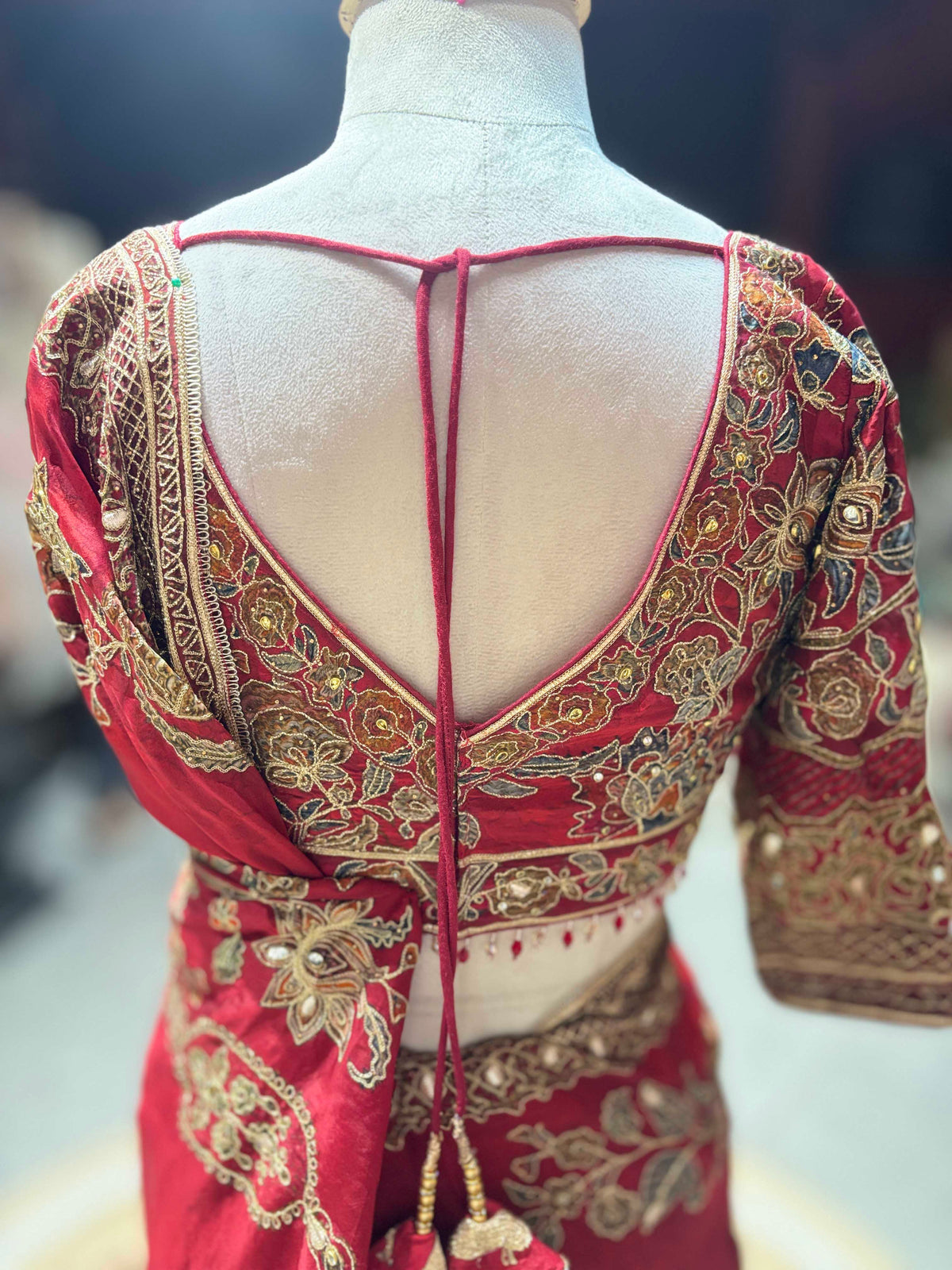 Red Designer Saree with Heavy Gold Floral Embroidery and Matching Blouse