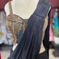 Black Designer Saree with Gold Embellished Blouse & Modern Draped Look