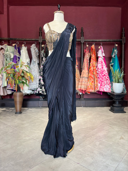 Black Designer Saree with Gold Embellished Blouse & Modern Draped Look