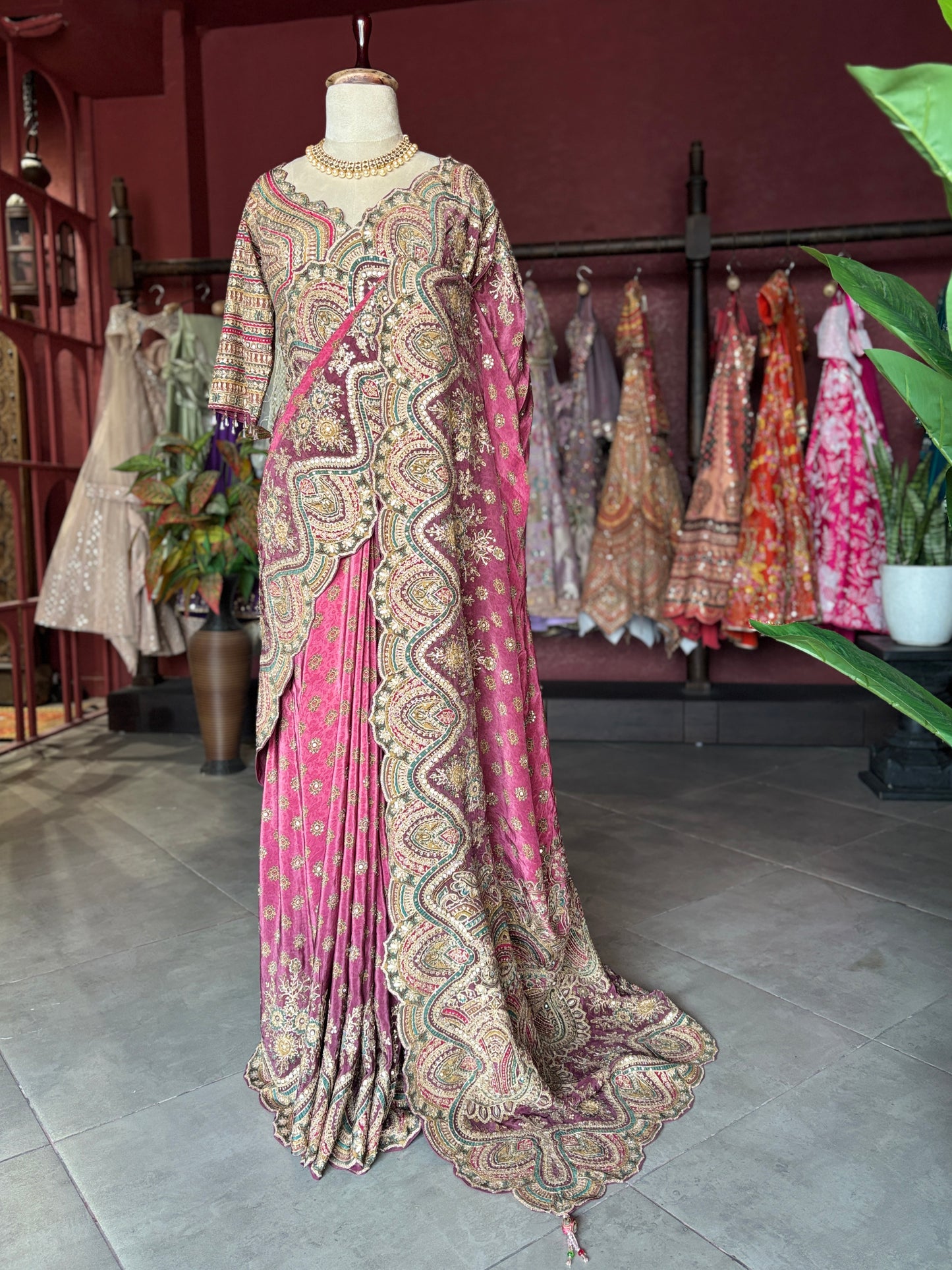 Rani Pink Paisley Designer Saree with Heavy Embroidered Border