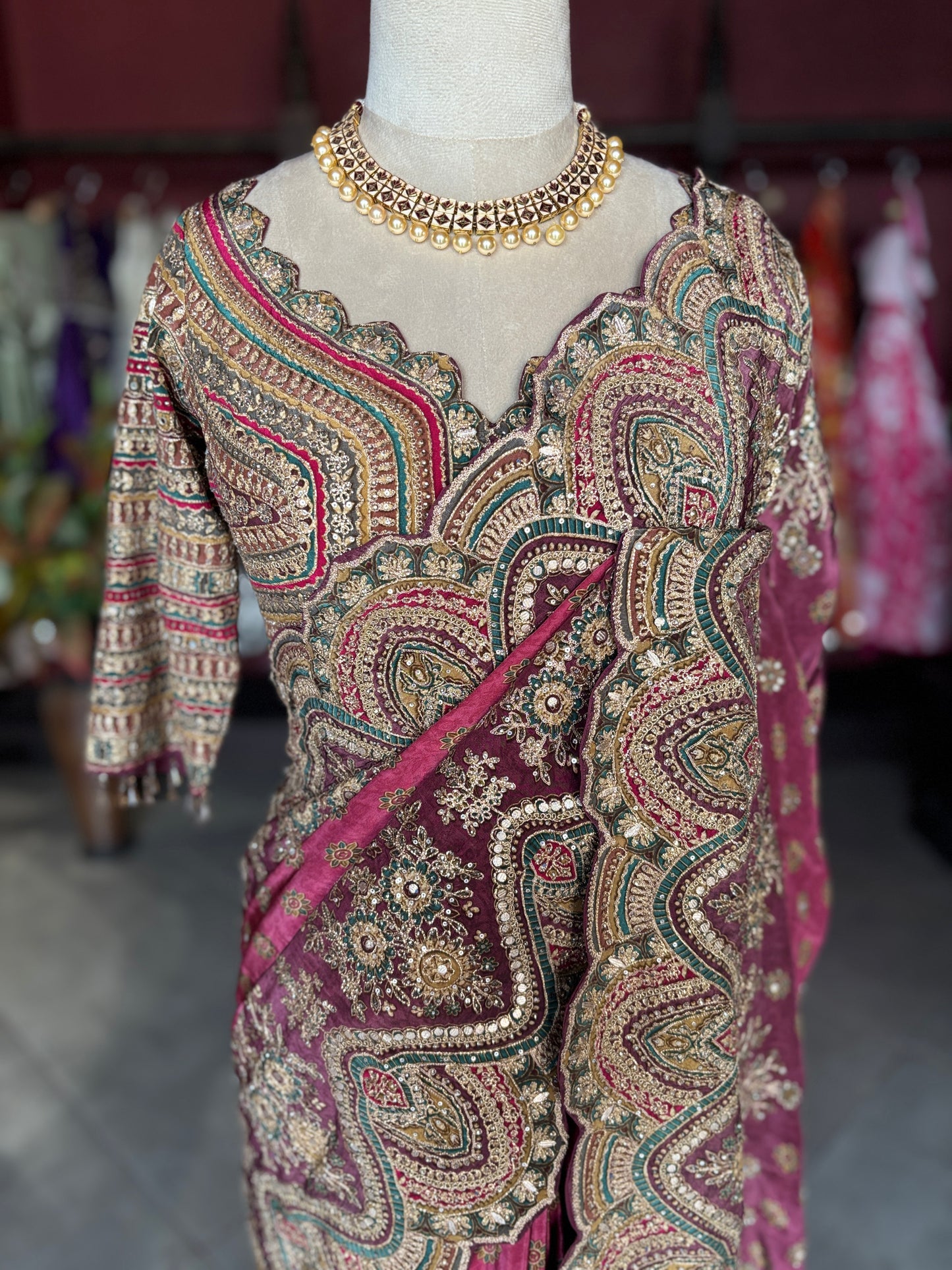 Rani Pink Paisley Designer Saree with Heavy Embroidered Border