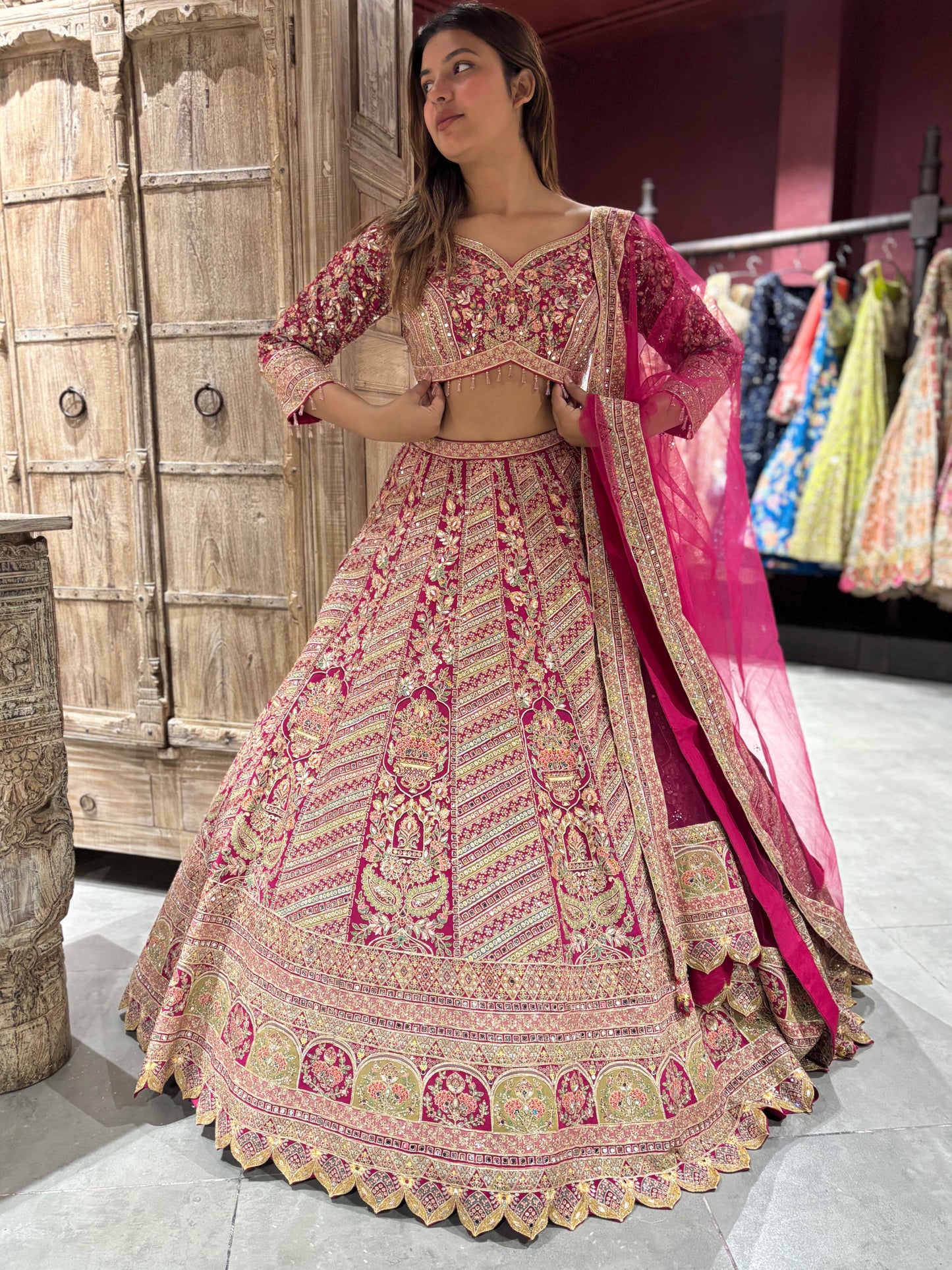Grand Designer Embroidered Lehenga with Floral & Vase Motifs
