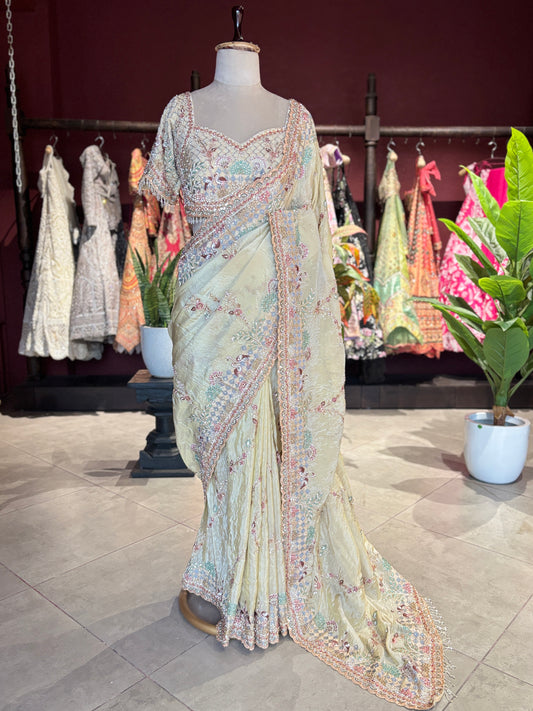 Pastel Yellow Designer Saree with Multicolor Embroidery & Heavy Border