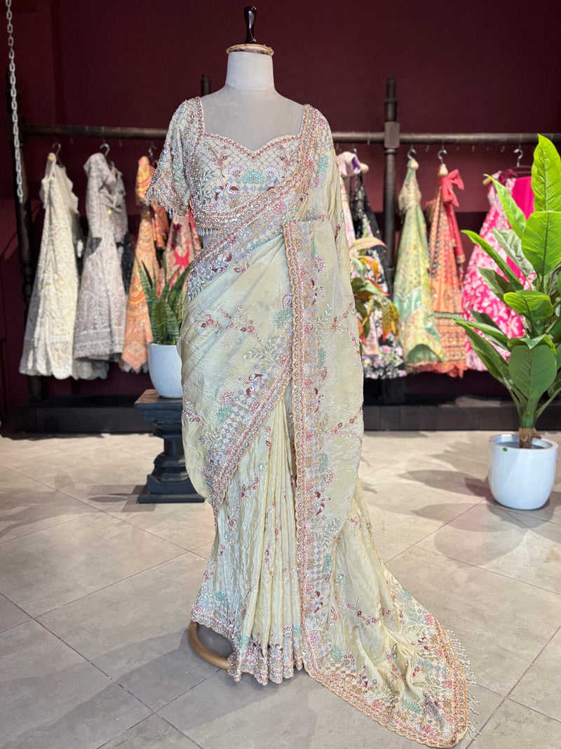Pastel Yellow Designer Saree with Multicolor Embroidery & Heavy Border
