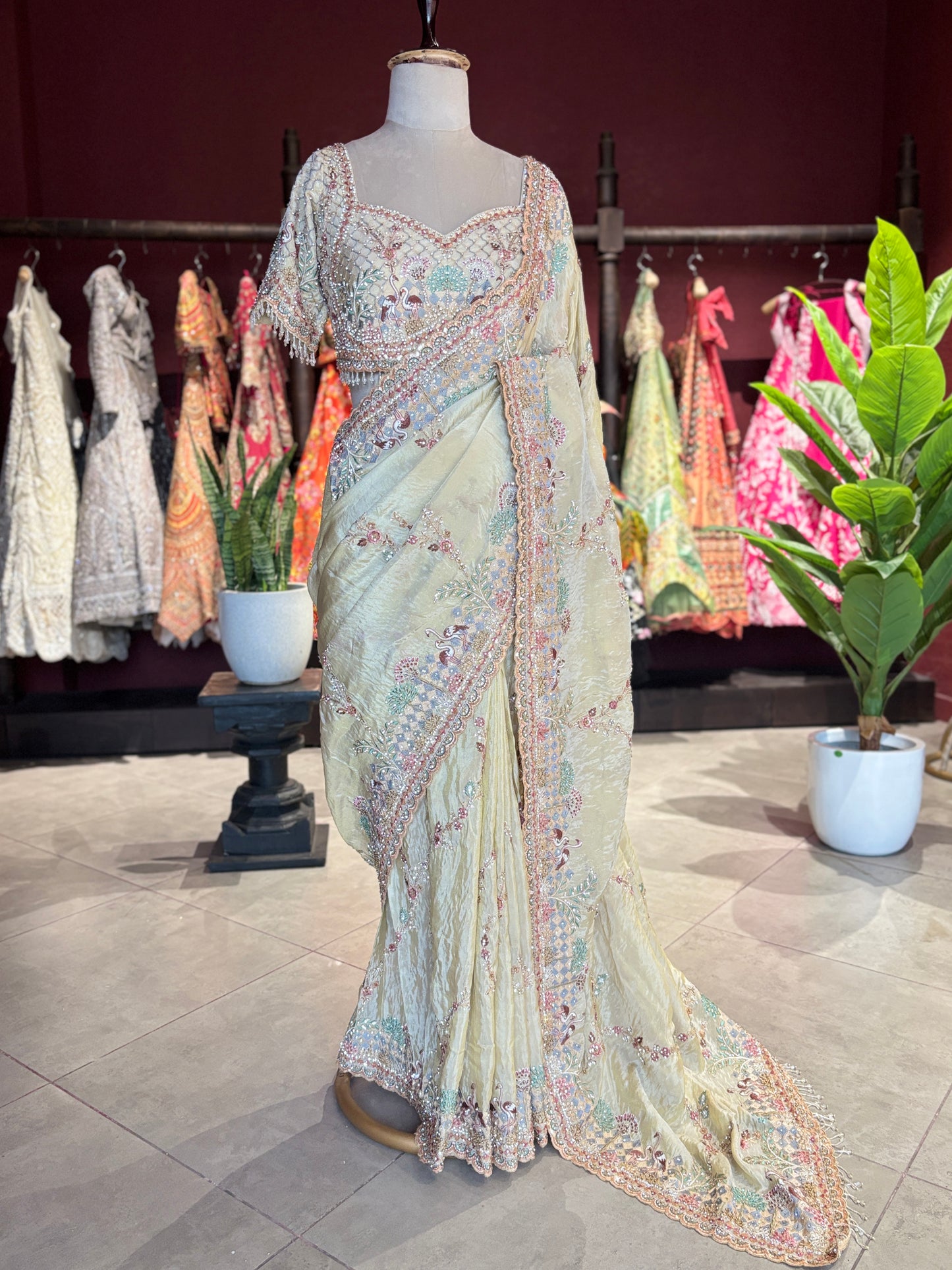 Pastel Yellow Designer Saree with Multicolor Embroidery & Heavy Border