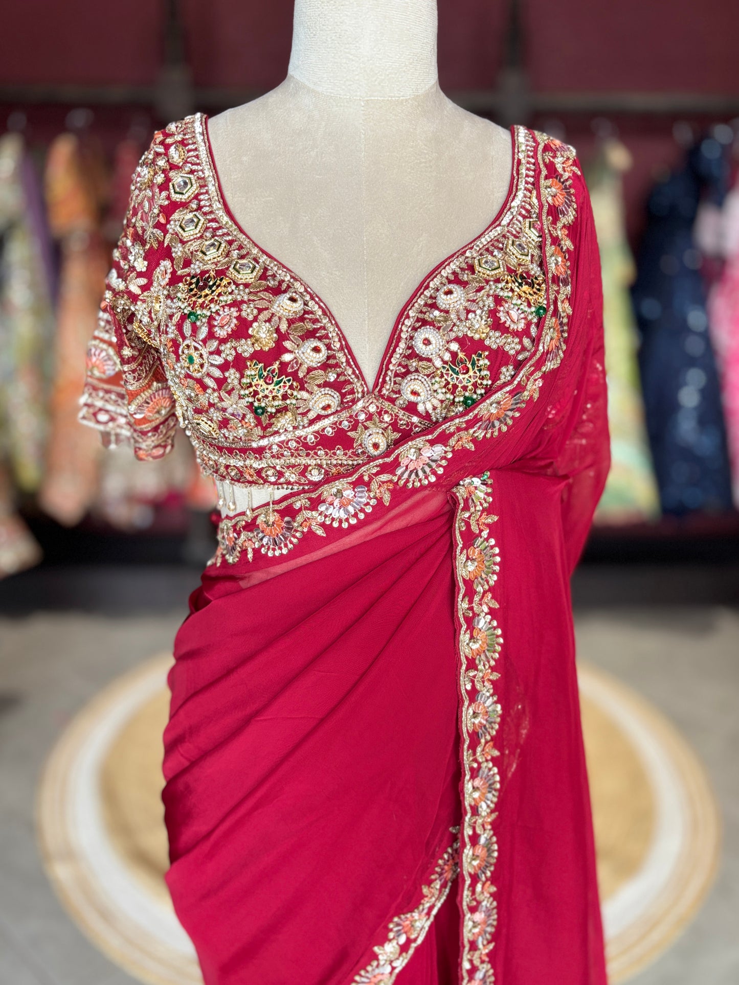 Red Designer Saree with Heavy Embroidered Blouse and Golden Border